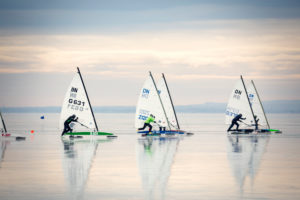 ice sailing European Championship on Lake Balaton in Hungary, The participants of the regatta push on the start of their ice sailors, start of the regatta ice sailing European Championship on Lake Balaton in Hungary, The participants of the regatta push on the start of their ice sailors, start of the regatta